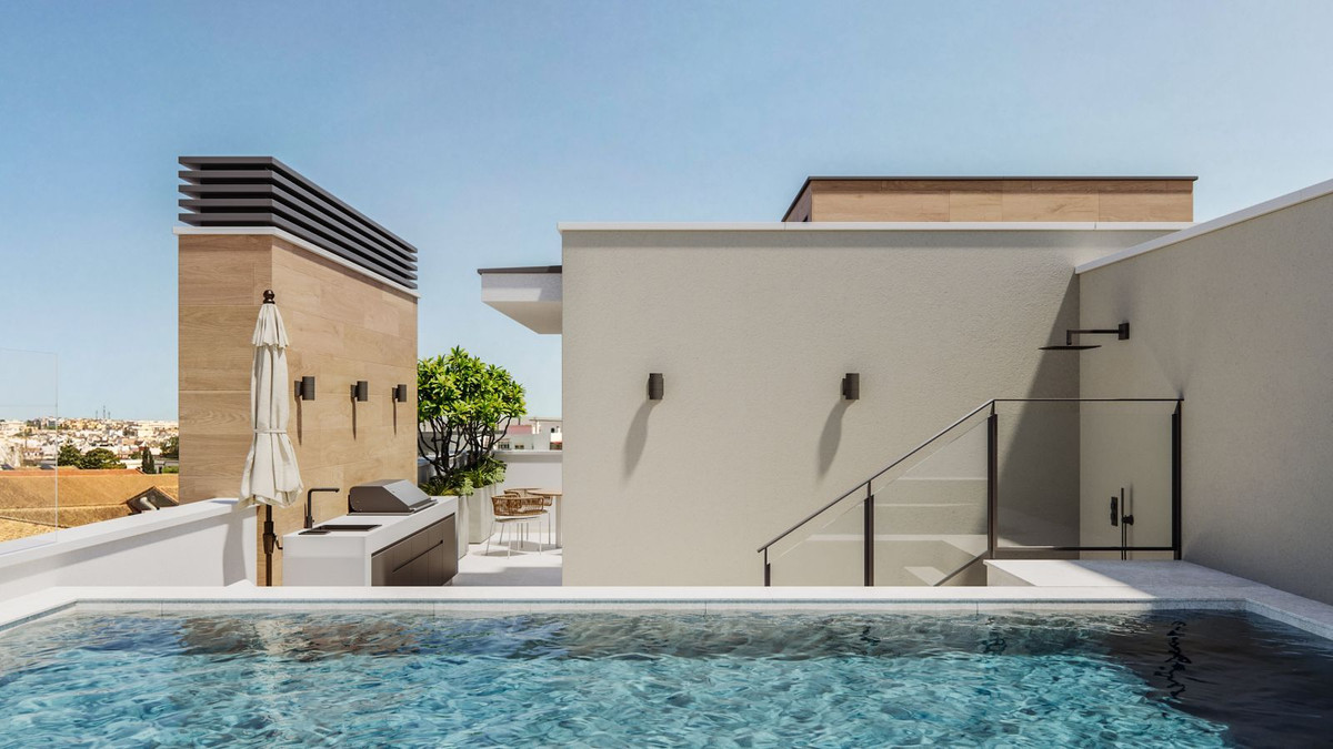 Modern rooftop pool with city view, outdoor kitchen, lounge area.